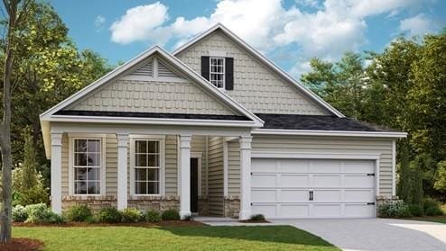 view of front of home with concrete driveway and a garage