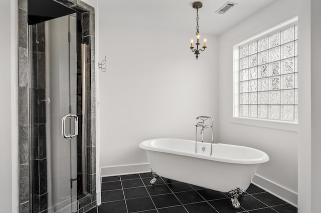 full bathroom featuring tile patterned floors, visible vents, a shower stall, baseboards, and a soaking tub