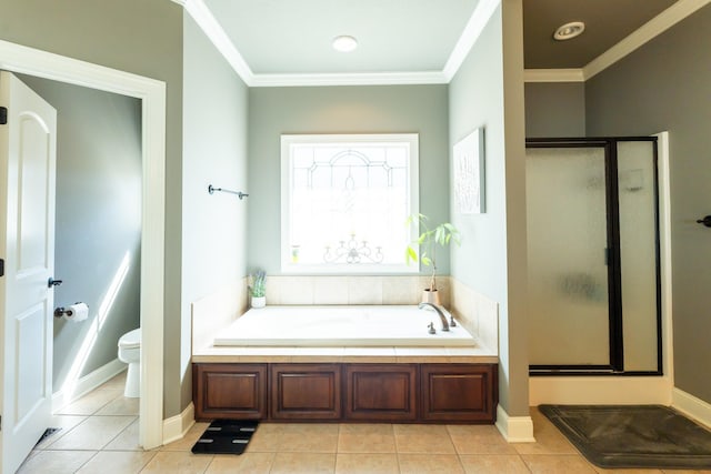 full bath featuring tile patterned flooring, a shower stall, crown molding, toilet, and a bath