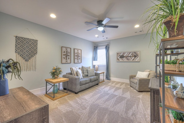 living room featuring visible vents, baseboards, carpet, recessed lighting, and a ceiling fan