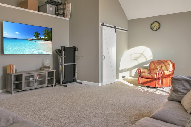 carpeted living area with a barn door, baseboards, and high vaulted ceiling