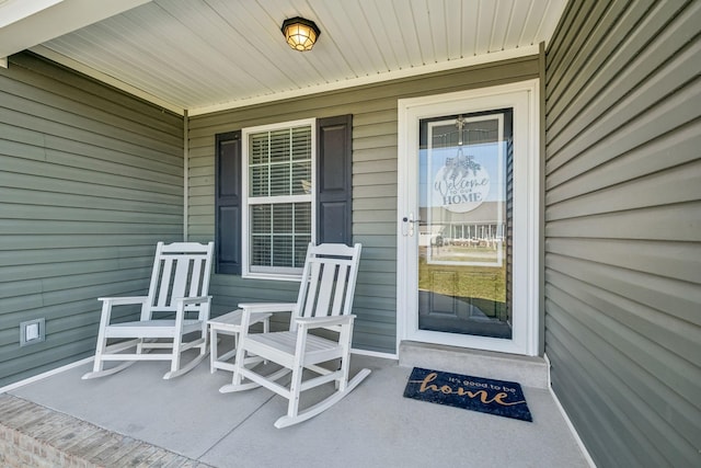 doorway to property featuring a porch