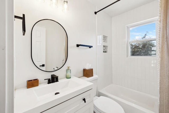 full bathroom with vanity, toilet, and washtub / shower combination