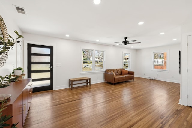 interior space featuring light wood-style flooring and recessed lighting