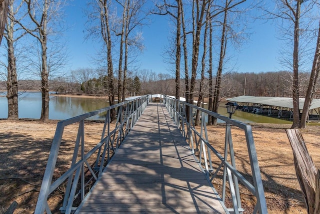 surrounding community with a water view