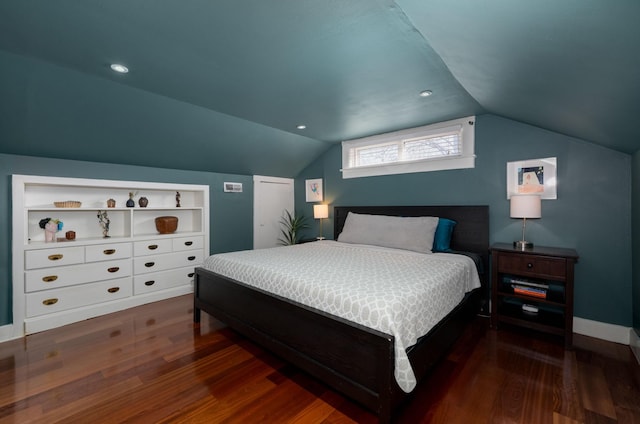 bedroom featuring recessed lighting, baseboards, wood finished floors, and vaulted ceiling