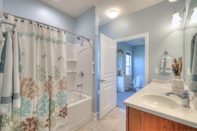 full bathroom featuring tile patterned floors, double vanity, shower / bath combo, and a sink