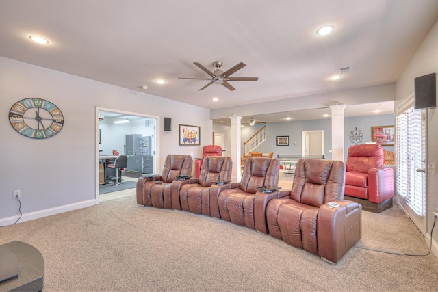 home theater room with light carpet, recessed lighting, decorative columns, baseboards, and ceiling fan