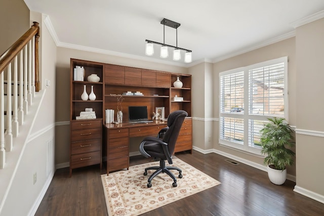 office space featuring baseboards, visible vents, dark wood-style flooring, and ornamental molding