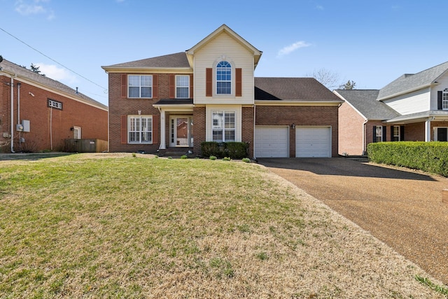 view of front of home with concrete driveway, brick siding, a garage, and a front lawn