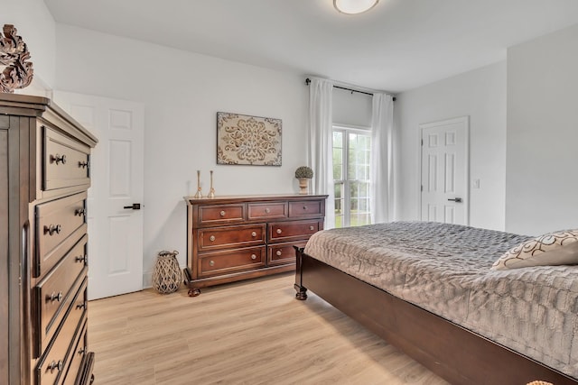 bedroom featuring light wood-type flooring