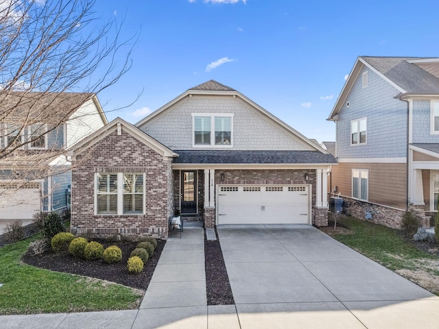 view of front of property with brick siding, concrete driveway, a front lawn, and a shingled roof