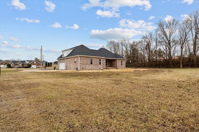 view of property exterior with a lawn and brick siding