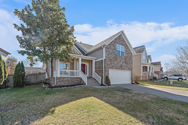 view of front of home featuring a front lawn, fence, a porch, concrete driveway, and a garage