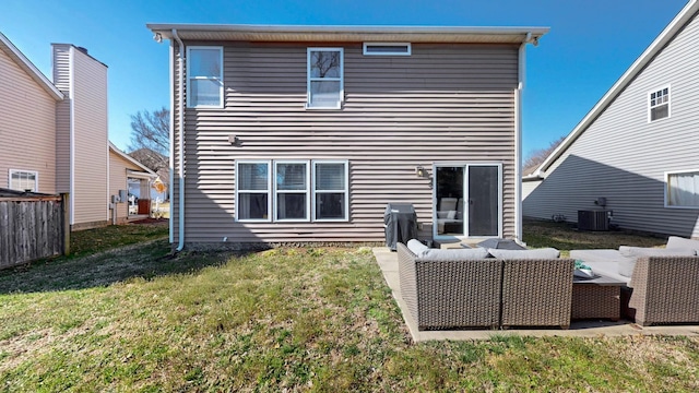 back of house with cooling unit, an outdoor hangout area, and a yard