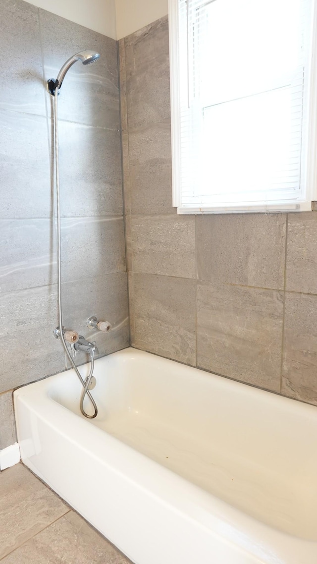 bathroom with tile patterned flooring