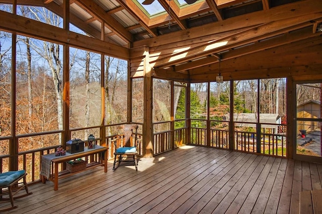 sunroom with a skylight and plenty of natural light