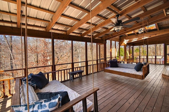 sunroom / solarium with ceiling fan