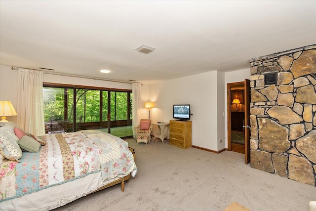 bedroom with baseboards, visible vents, carpet, and access to exterior