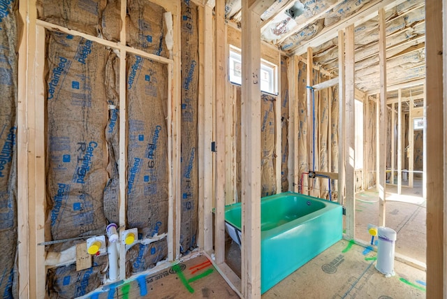 full bathroom with a washtub