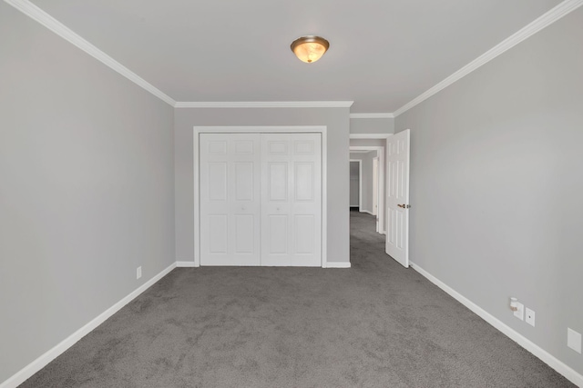 unfurnished bedroom with carpet flooring, crown molding, and baseboards