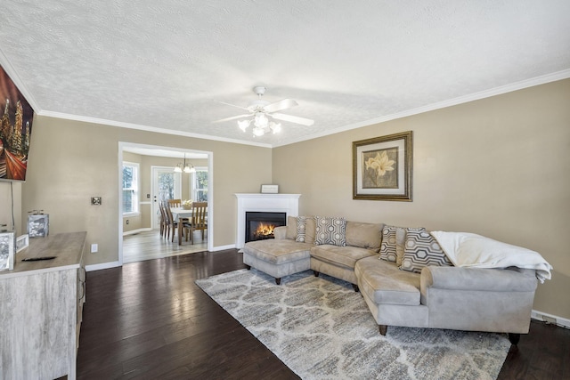 living room with baseboards, dark wood-style flooring, and ornamental molding