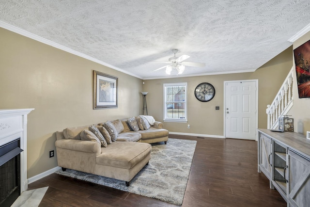 living area with dark wood finished floors, a fireplace with flush hearth, and baseboards