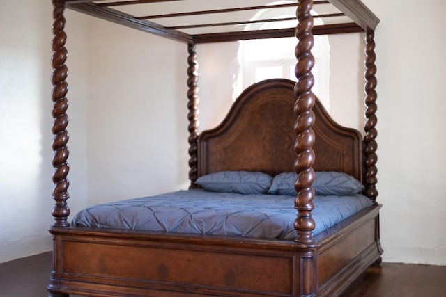 bedroom featuring wood finished floors