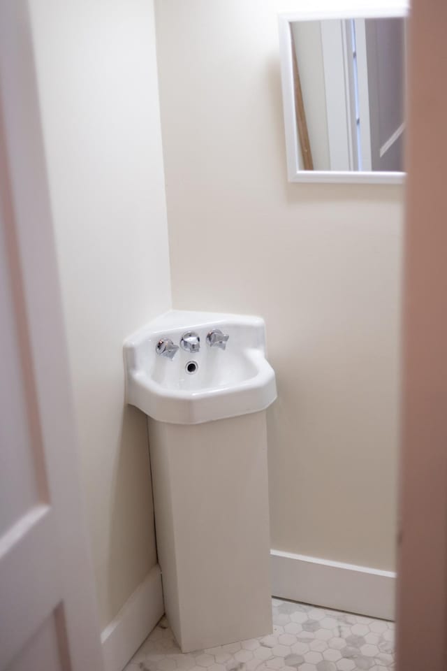 bathroom with baseboards