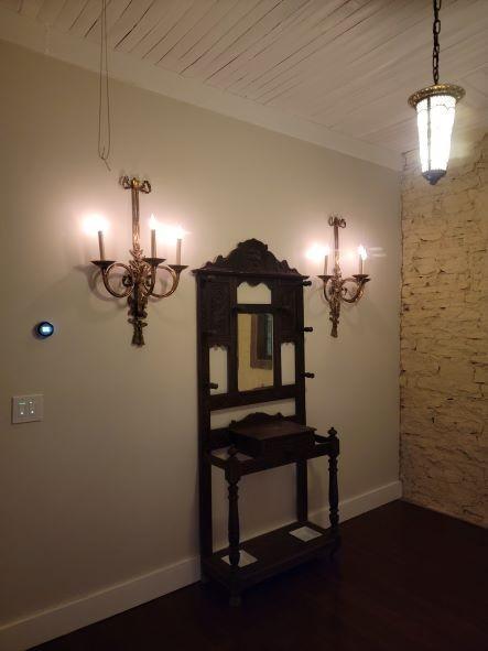 interior space featuring baseboards, dark wood-type flooring, and wood ceiling