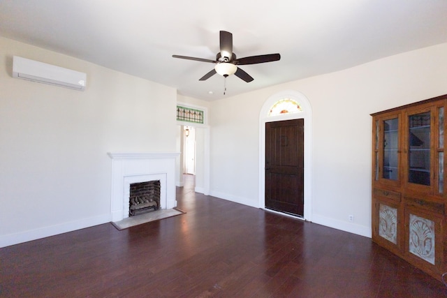 unfurnished living room with a fireplace with flush hearth, wood finished floors, baseboards, and a wall mounted air conditioner