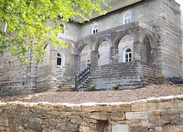 view of front of property featuring stone siding