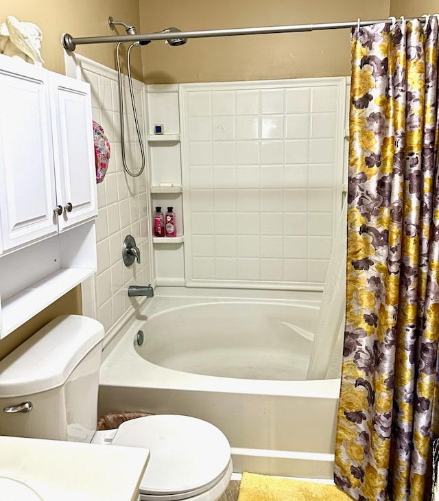 full bath with toilet and shower / bath combo