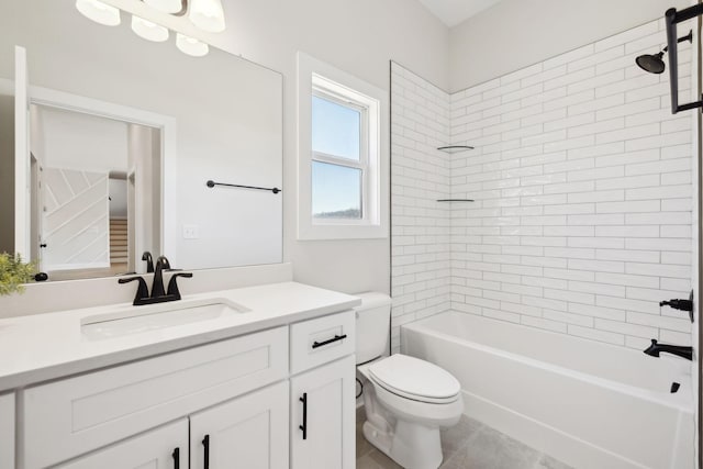 bathroom with vanity, shower / bathing tub combination, and toilet