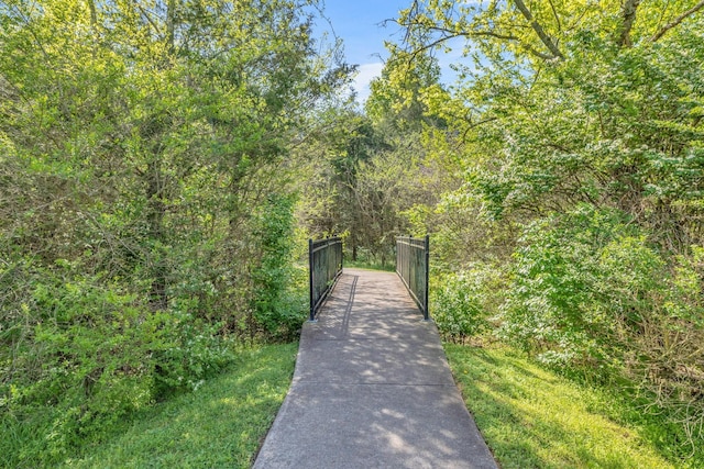 view of gate with fence