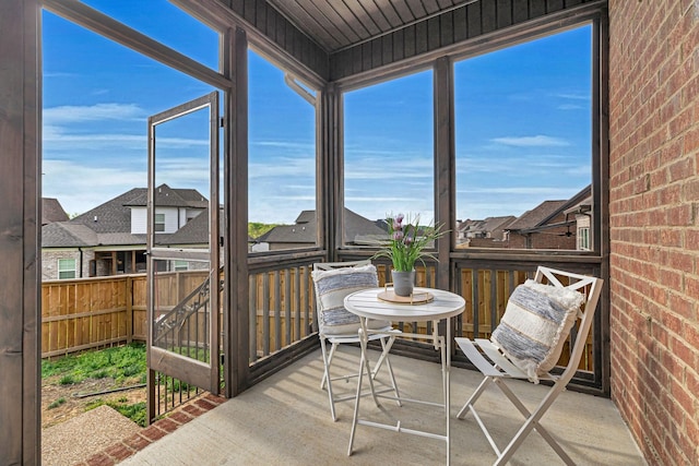 sunroom / solarium featuring plenty of natural light