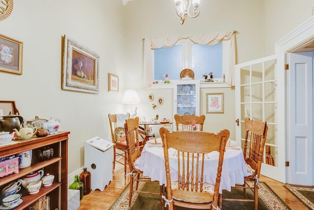 dining area featuring light wood-style floors