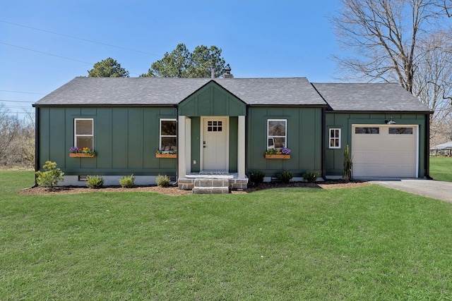 view of front of home with a front yard, an attached garage, board and batten siding, and crawl space