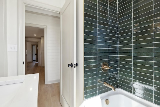 full bathroom with shower / tub combination and wood finished floors