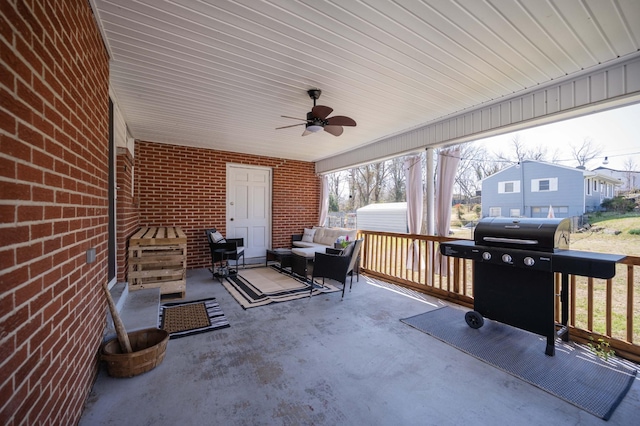 view of patio / terrace with a grill, an outdoor hangout area, and a ceiling fan