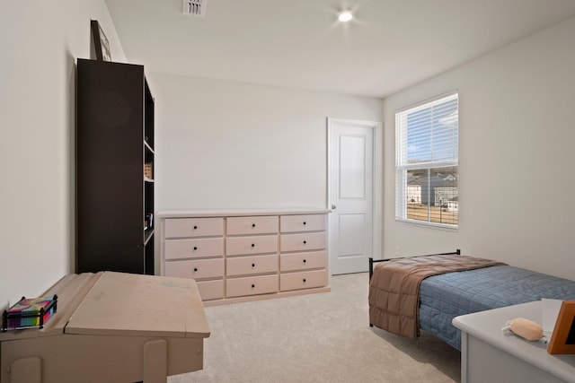 bedroom featuring visible vents and carpet floors