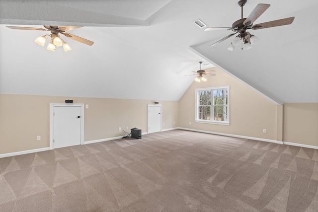 bonus room with light carpet, baseboards, lofted ceiling, and ceiling fan