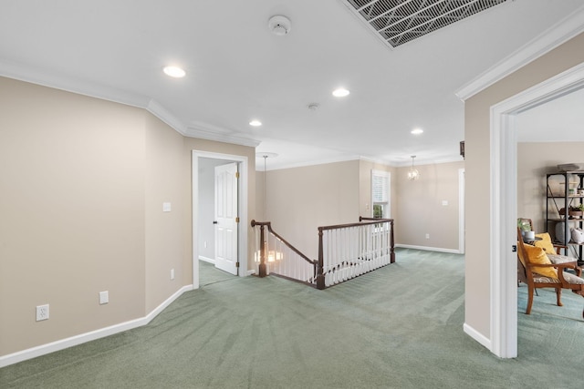 carpeted empty room featuring recessed lighting, visible vents, baseboards, and crown molding