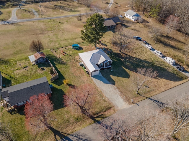 birds eye view of property featuring a rural view