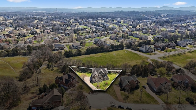 drone / aerial view with a mountain view and a residential view