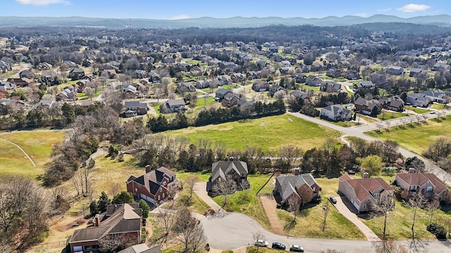 drone / aerial view with a mountain view and a residential view