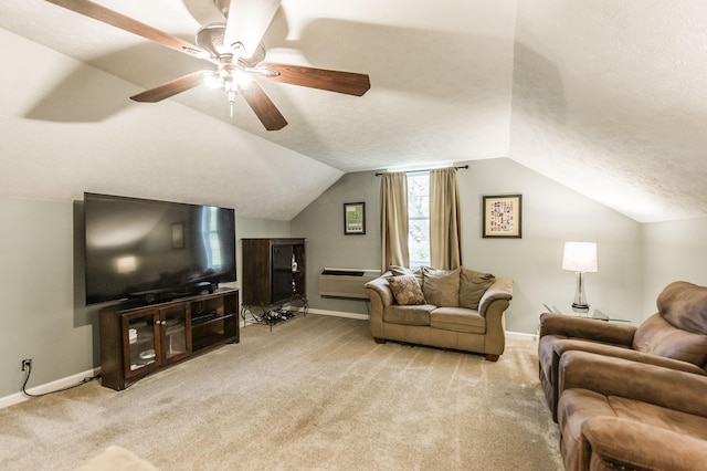 carpeted living area featuring baseboards, a textured ceiling, lofted ceiling, and a wall unit AC