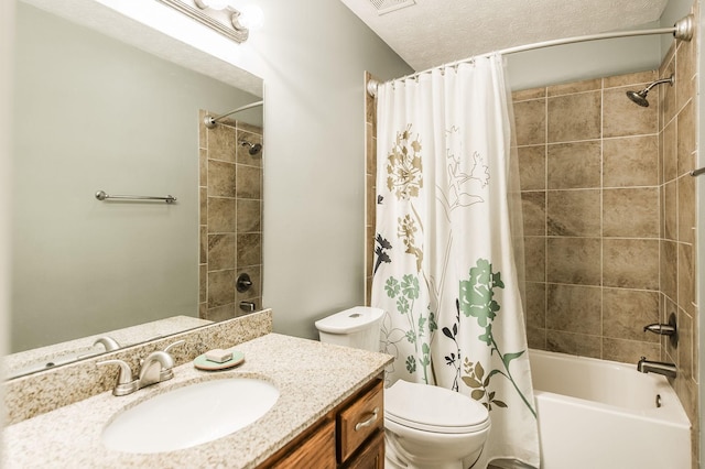 bathroom with shower / bathtub combination with curtain, toilet, vanity, and a textured ceiling