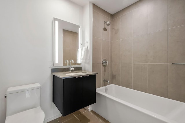 full bath with vanity, tile patterned floors, toilet, and shower / bath combination