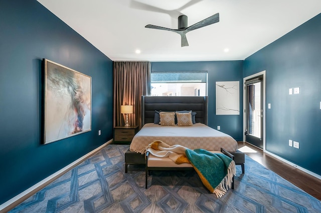 bedroom featuring baseboards and a ceiling fan